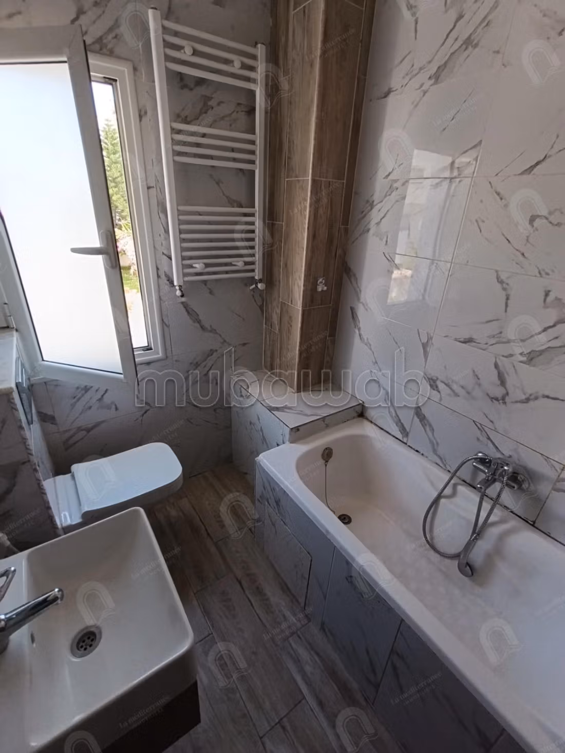 A louer un appartement s2 à jardin d'el menzah 2