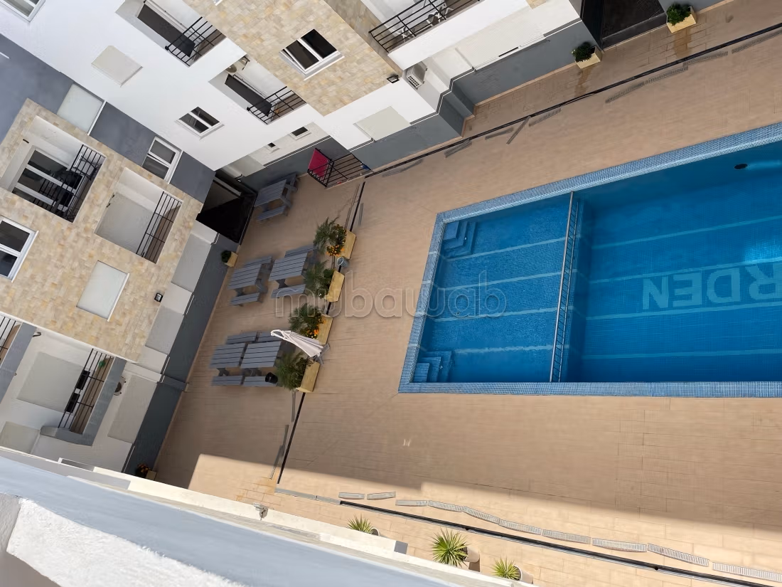 Vacation apartment for rent in Martil. 2 nice bedrooms. Concierge service, beautiful pool