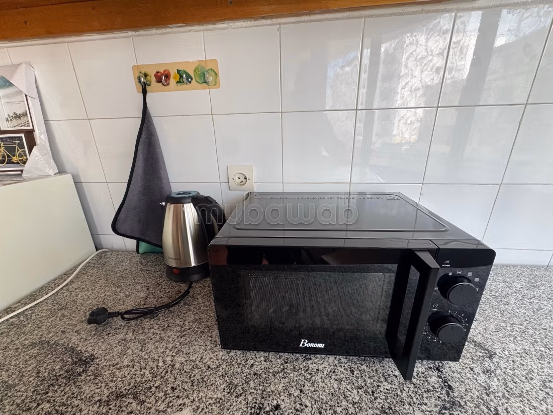 Appartement bien équipé au plein centre avec terrasse avec wifi