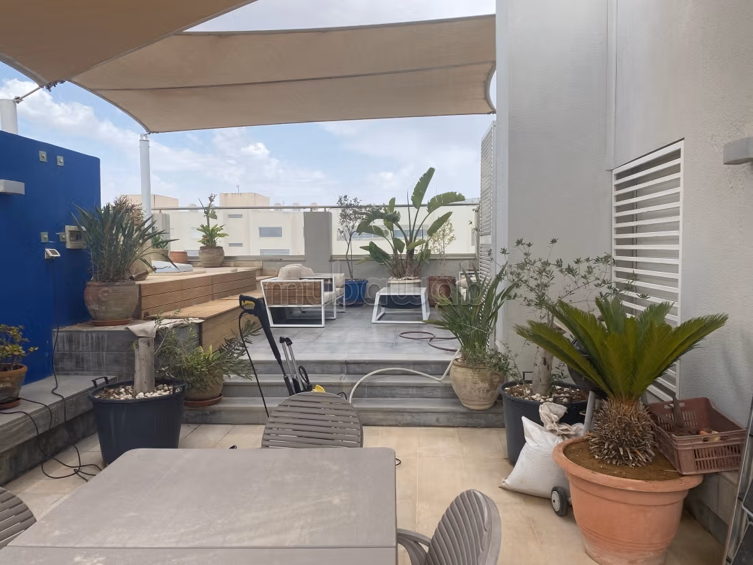 A beautiful penthouse with a pool