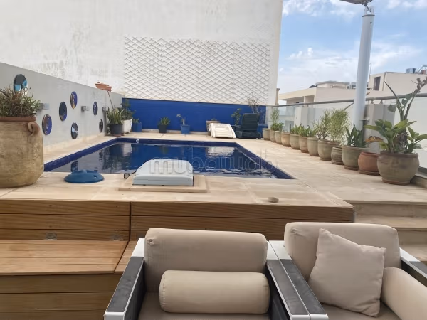 A beautiful penthouse with a pool