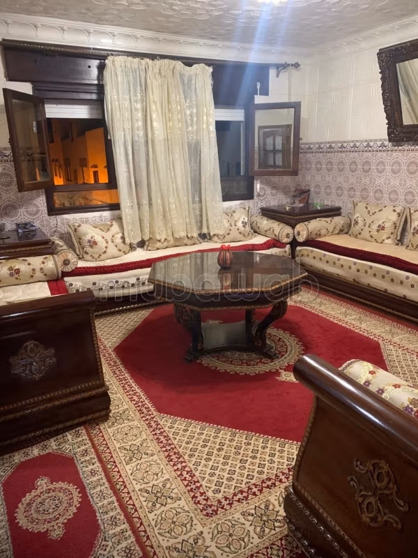 Location saisonnière à Asilah. 2 chambres agréables. Salon traditionnel marocain, résidence sécurisée