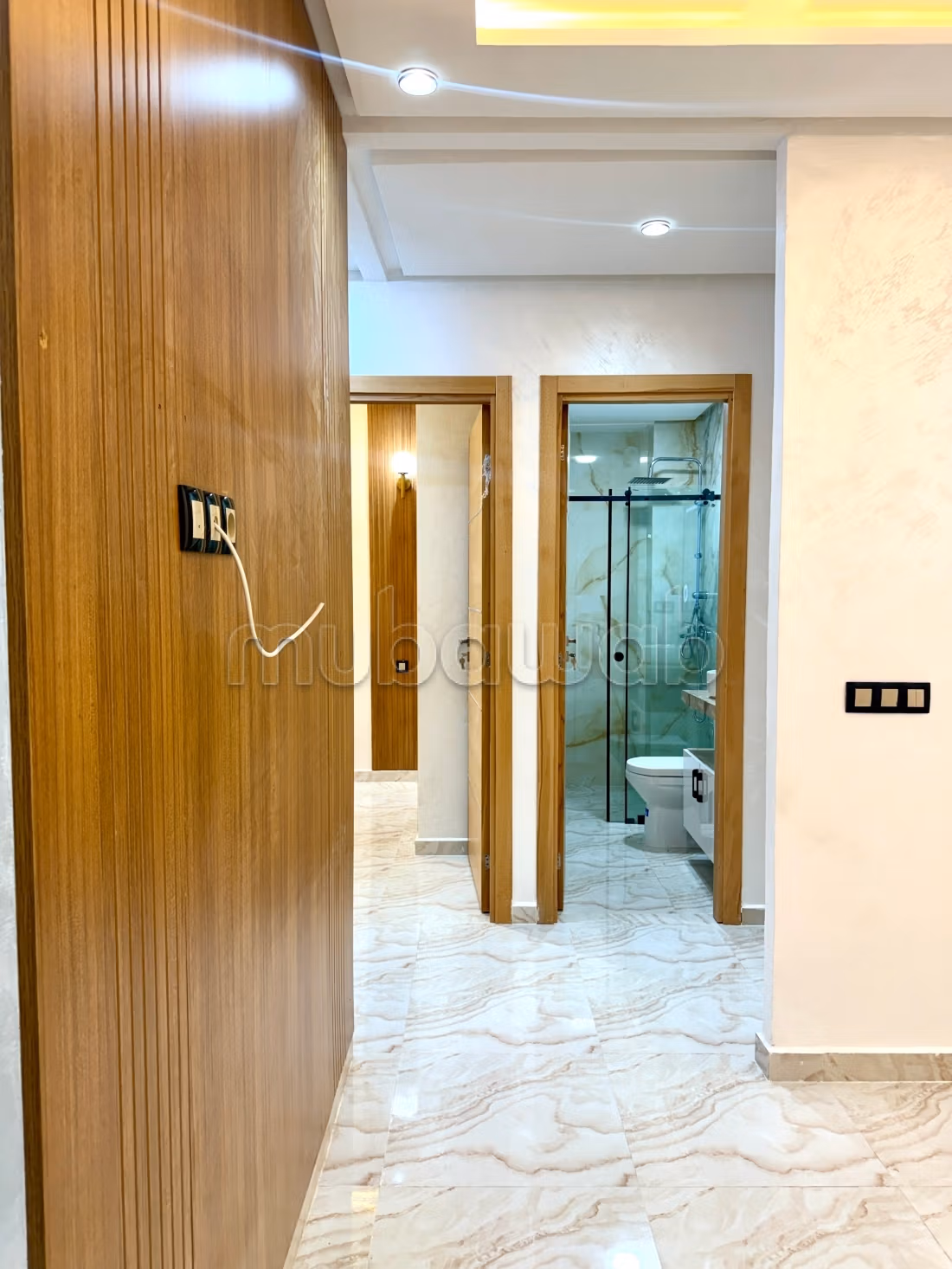 Appartement à vendre à Bouznika. 
Surface totale 54 m². 
Porte blindée et système de double vitrage — 6