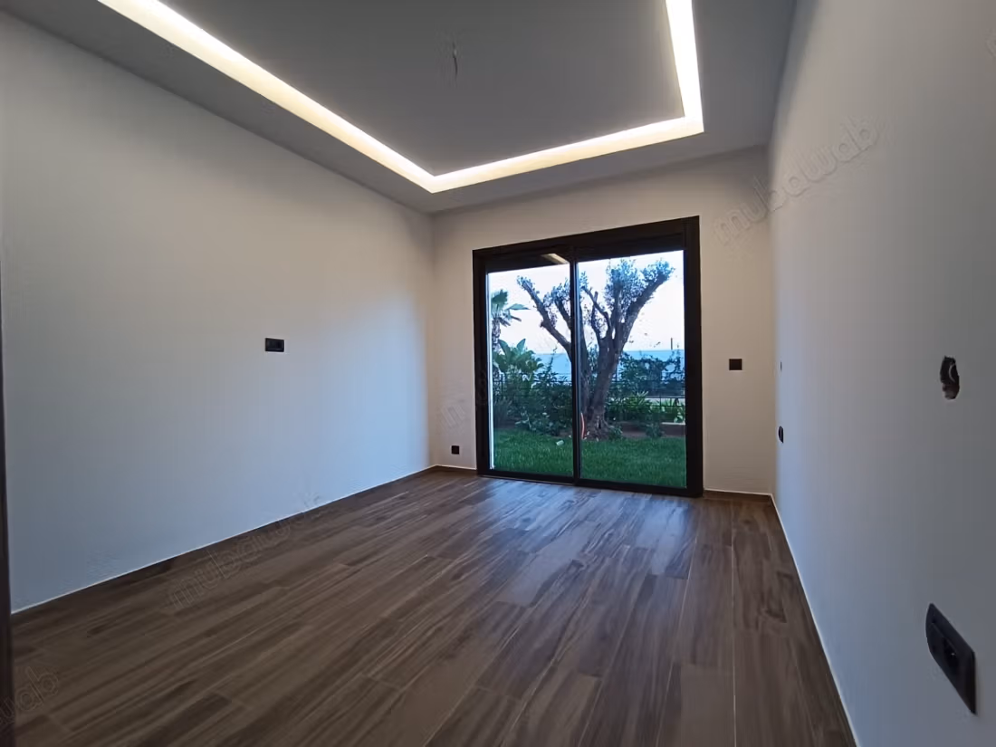 Appartamento al piano giardino premium con giardino a Dar Bouazza