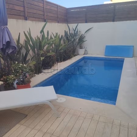 Bel appartement moderne en location à La Marsa avec piscine. Superficie 100 m². Porte blindée et chauffage central
