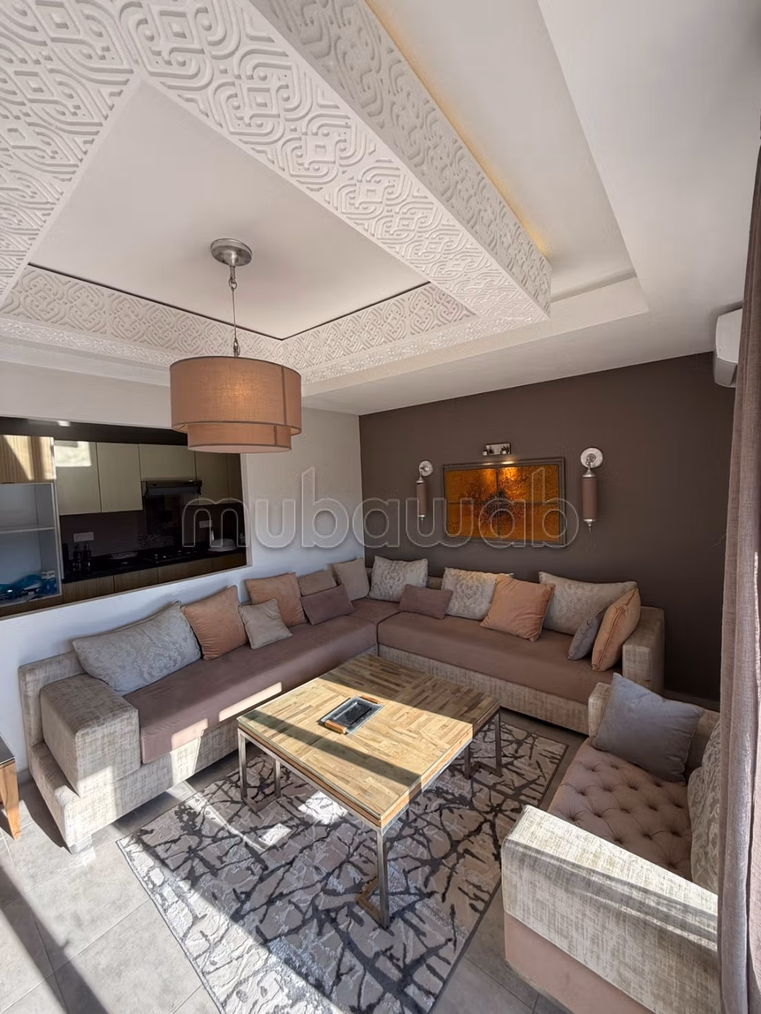 Apartments for rent in Saidia. Area 68 m². Traditional lounge and satellite dish system
