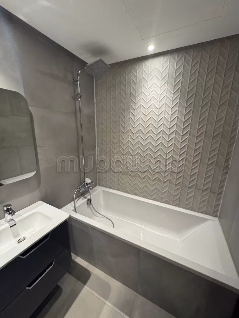 Beautiful apartment for rent in Souissi. 2 pleasant bedrooms. Air conditioning and fireplace