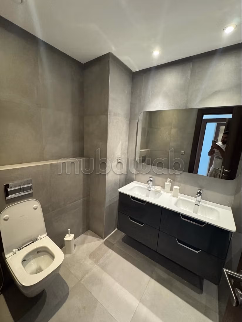 Beautiful apartment for rent in Souissi. 2 pleasant bedrooms. Air conditioning and fireplace