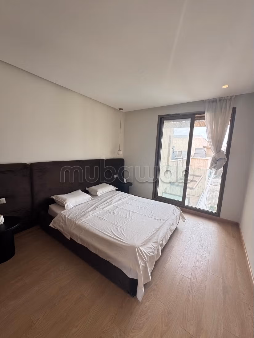 Beautiful apartment for rent in Souissi. 2 pleasant bedrooms. Air conditioning and fireplace
