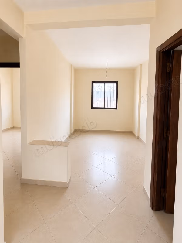 Vind een appartement om te kopen in Tamansourt Marrakech. 2 mooie kamers. Versterkte deur
