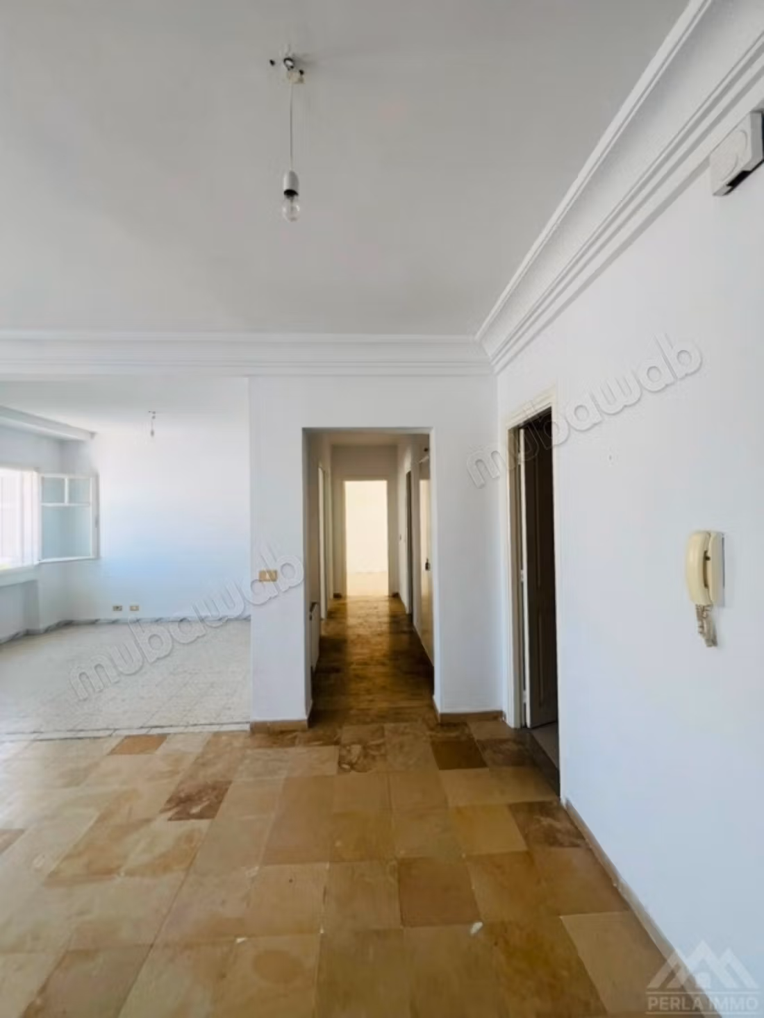 À vendre un appart s3 transformé en s2 à Laouina