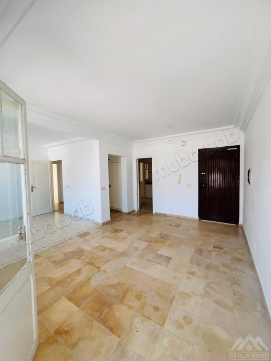 À vendre un appart s3 transformé en s2 à Laouina