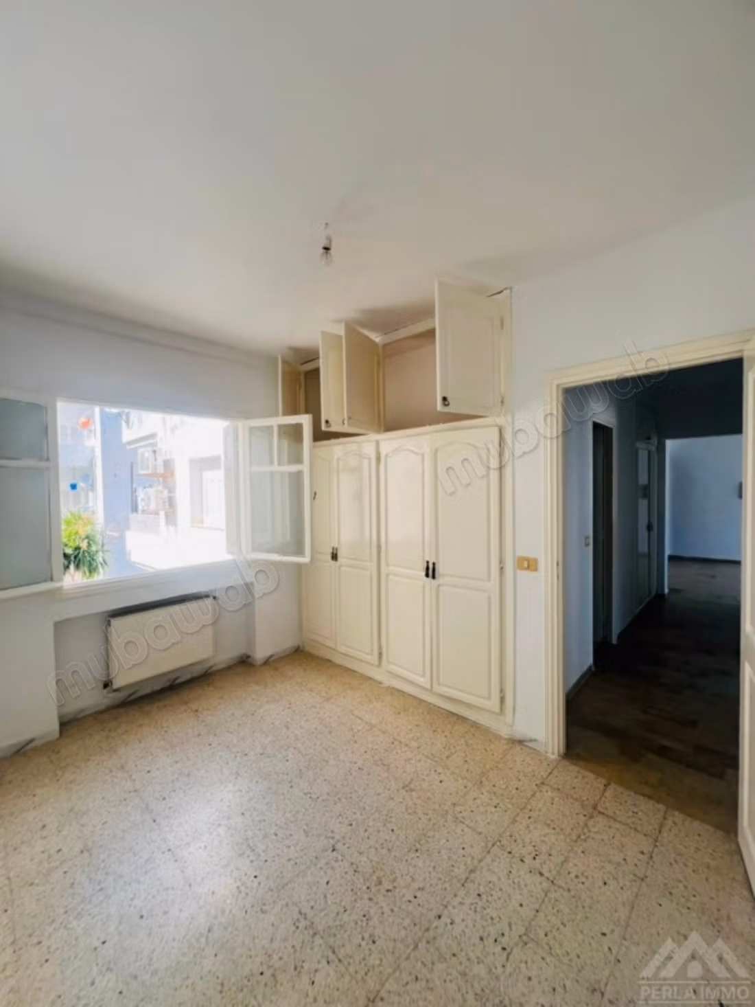 À vendre un appart s3 transformé en s2 à Laouina