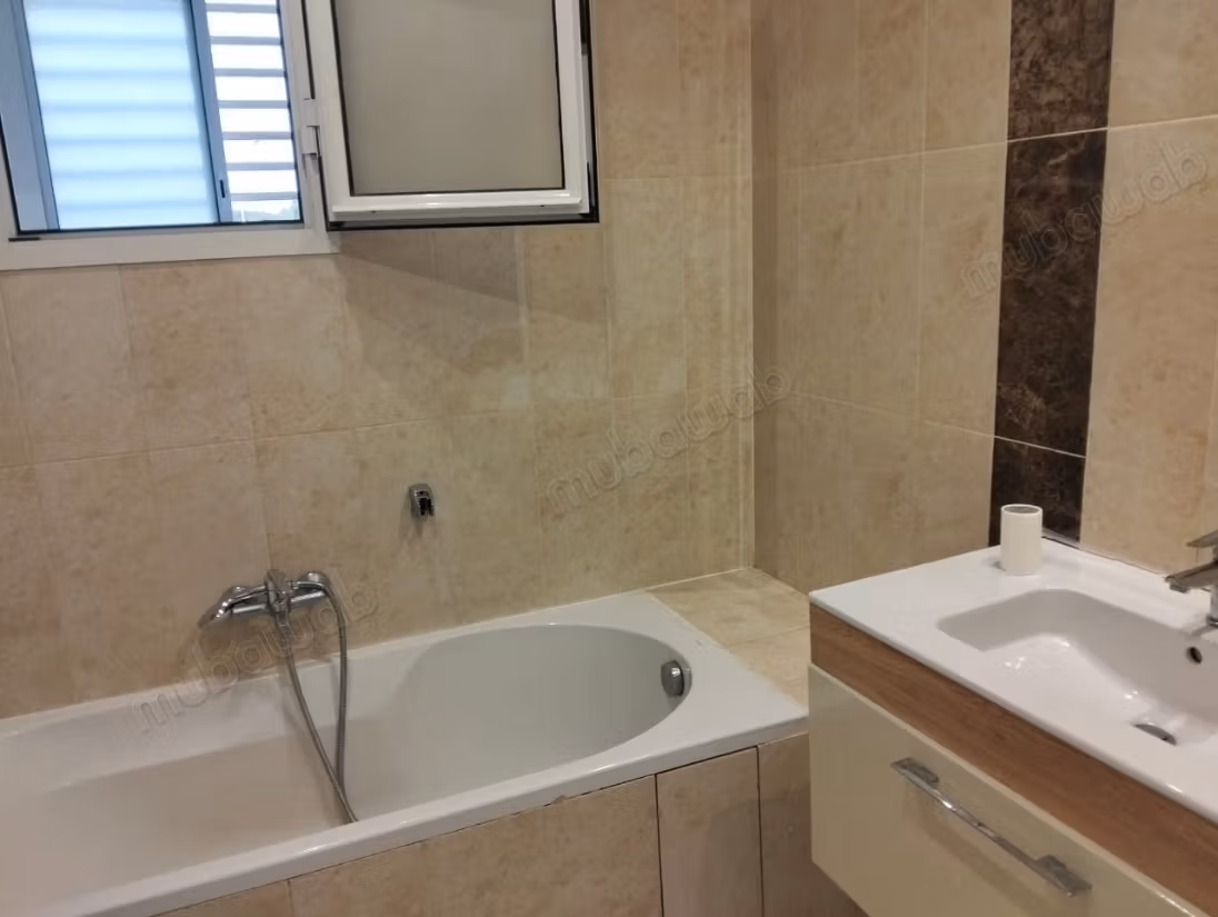 Location ennasr1 grand s3 terrasse haut standing