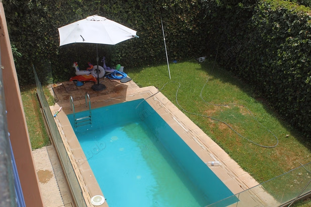 Villa for Sale on a Three-Faced Garden