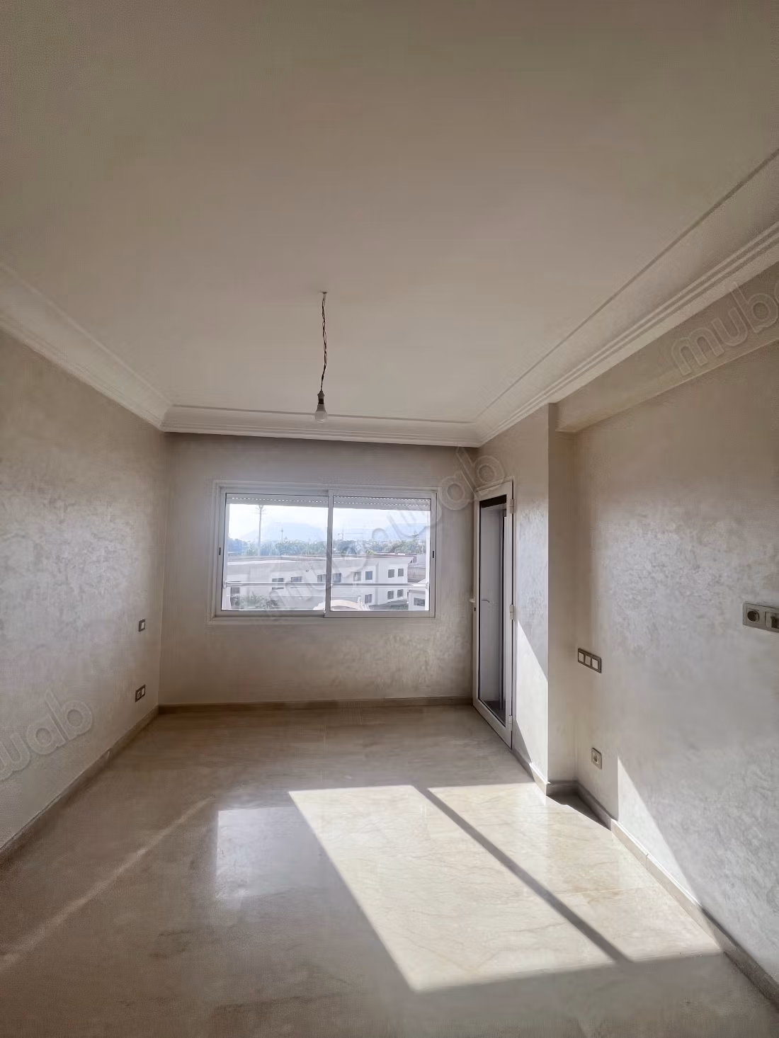 Appartement à louer dans la Zone Industrielle d'Agadir. 2 belles chambres. Résidence avec gardien, grande piscine