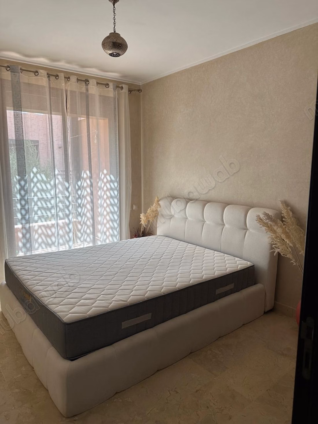 Apartment for sale on Route de l'Ourika. 3 rooms. Fireplace and air conditioning