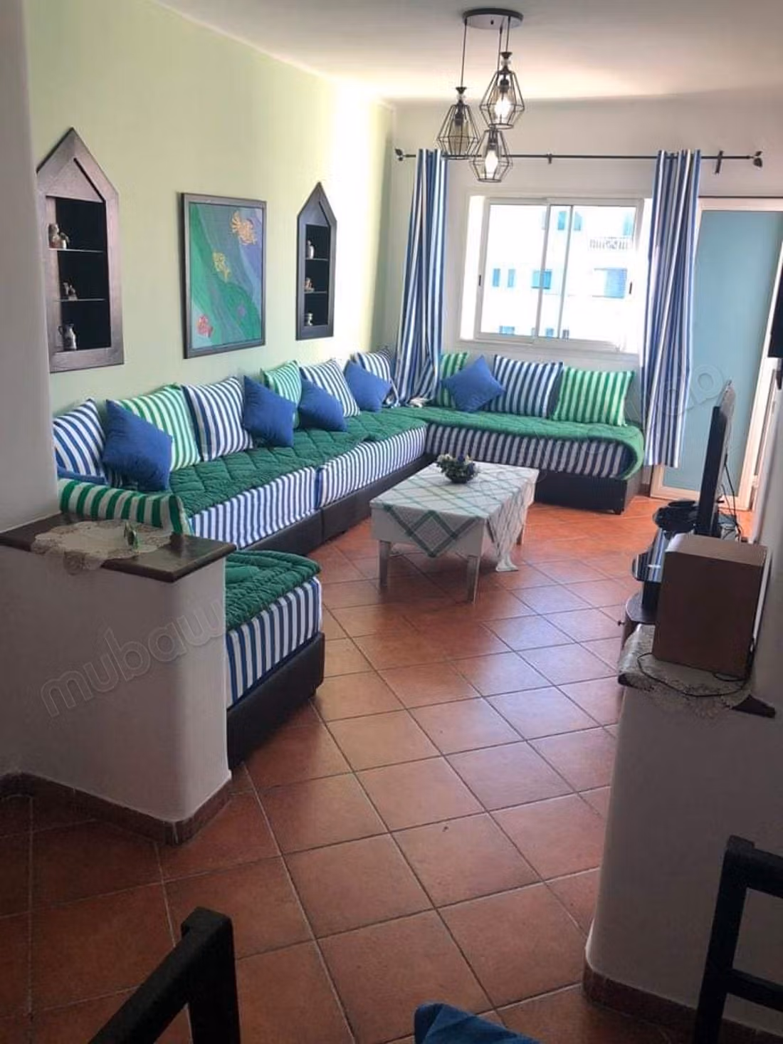 Holiday apartment for rent in M'Diq. 2 comfortable rooms. Traditional lounge and satellite dish system