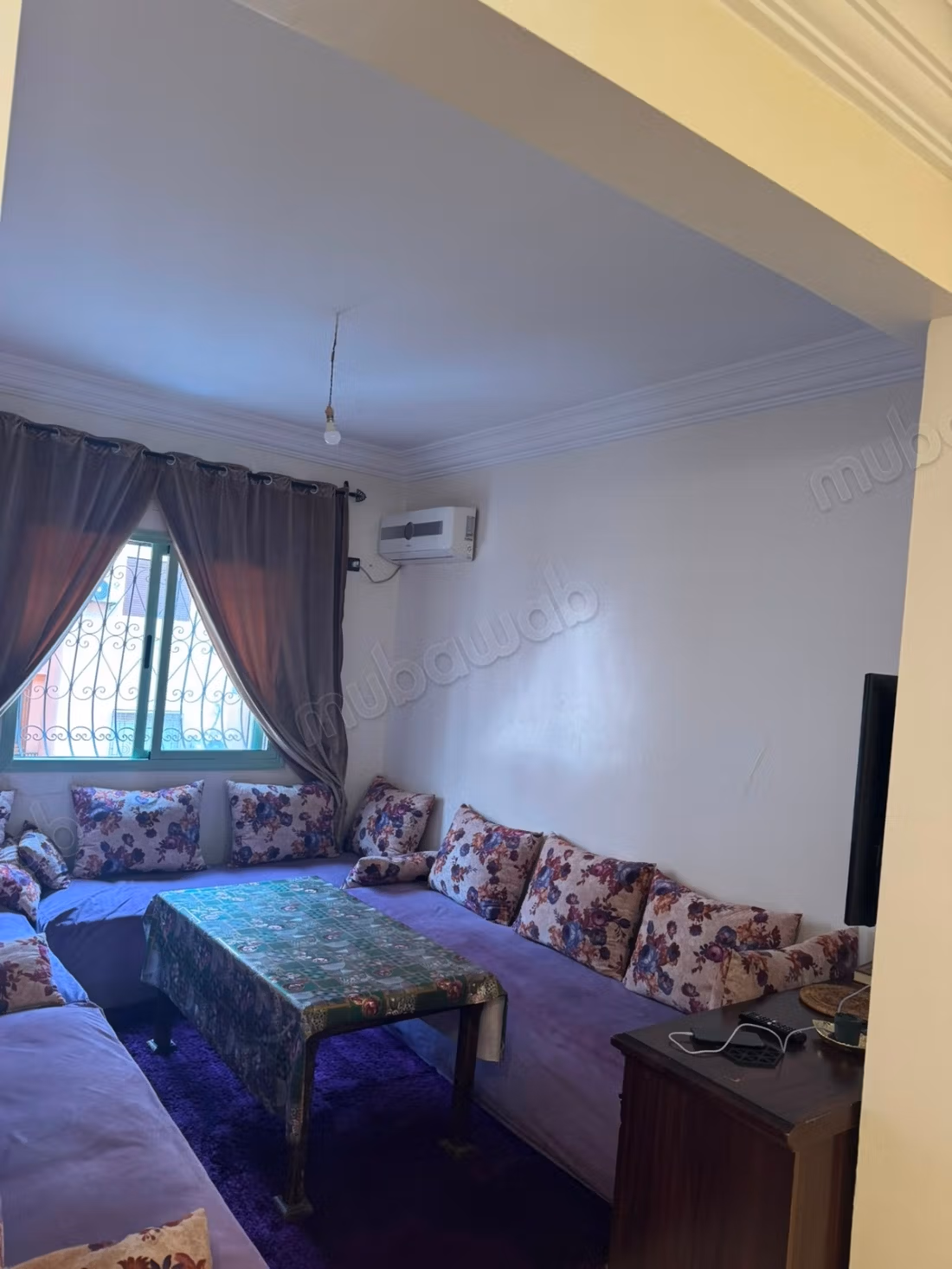Bel appartement à vendre à Bab Ghliz. Surface de 55 m². Résidence avec portail, et climatisation.