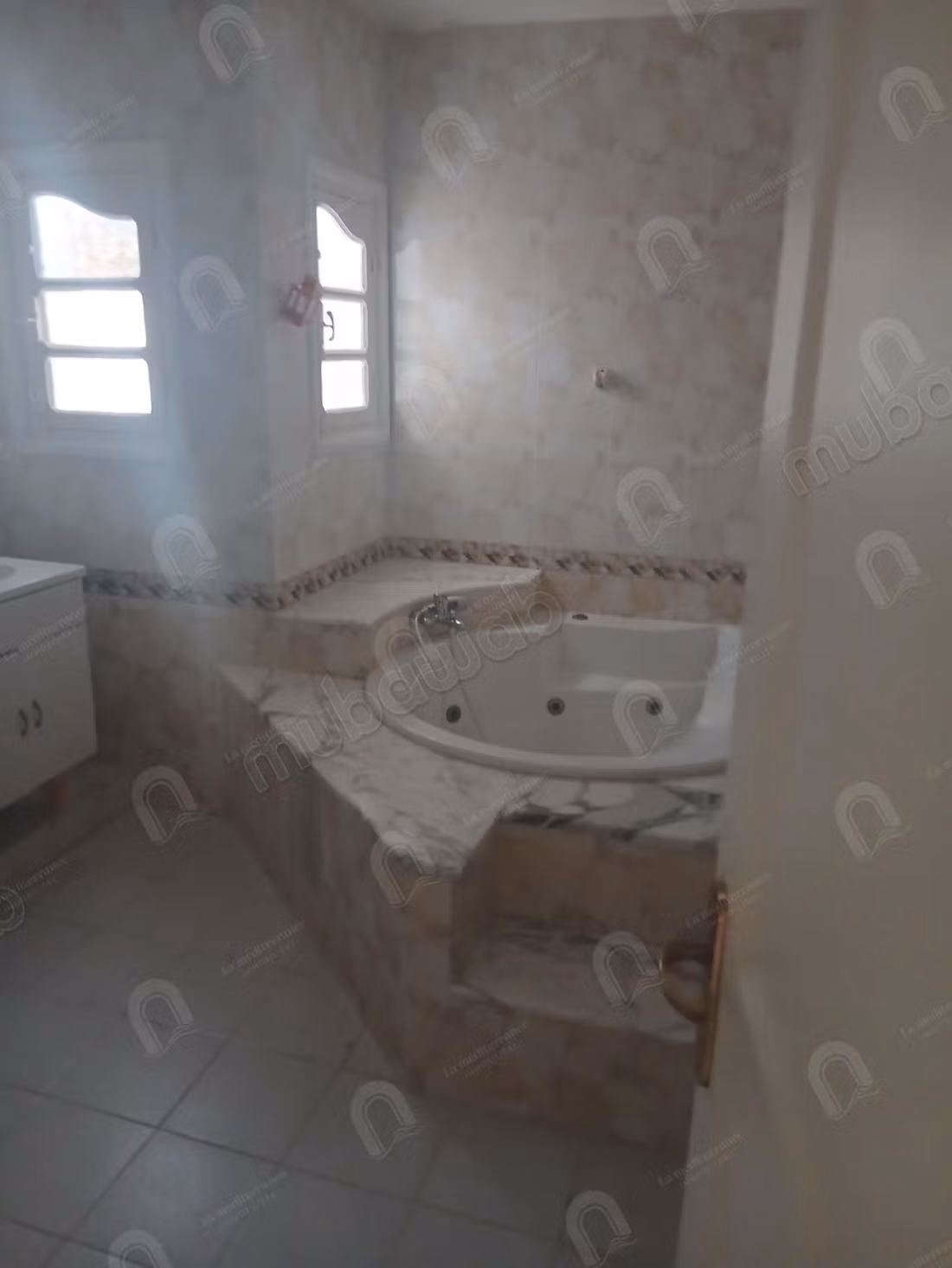 A louer une villa s4 à cité ennaser 2
