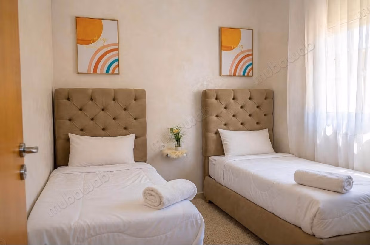 Apartment rental in Gueliz. 2 cozy bedrooms. Traditional lounge and satellite system