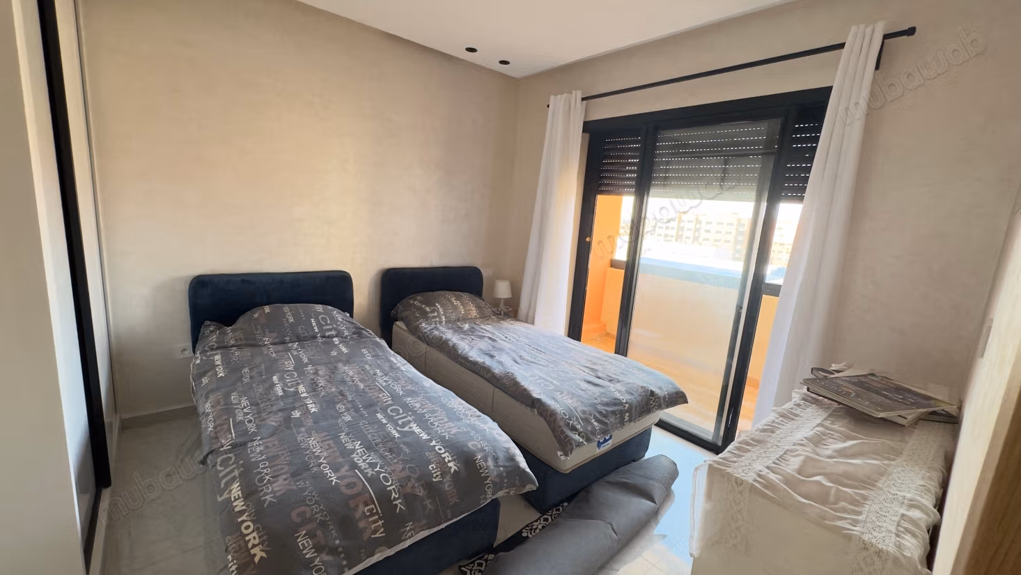 Appartamento arredato con 2 camere da letto nuovo in affitto a lungo termine nella residenza Hivernage con piscina