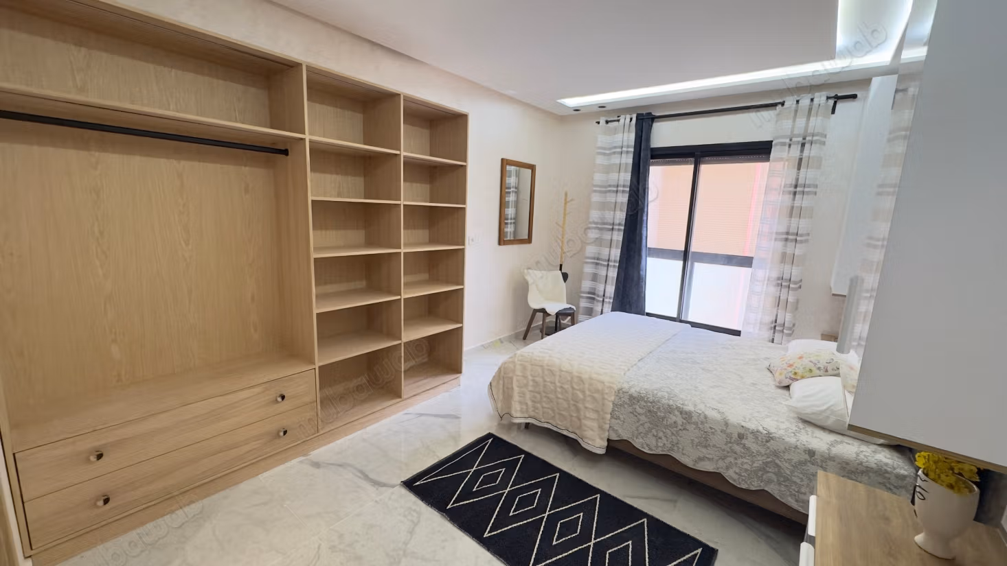 Appartamento arredato con 2 camere da letto nuovo in affitto a lungo termine nella residenza Hivernage con piscina