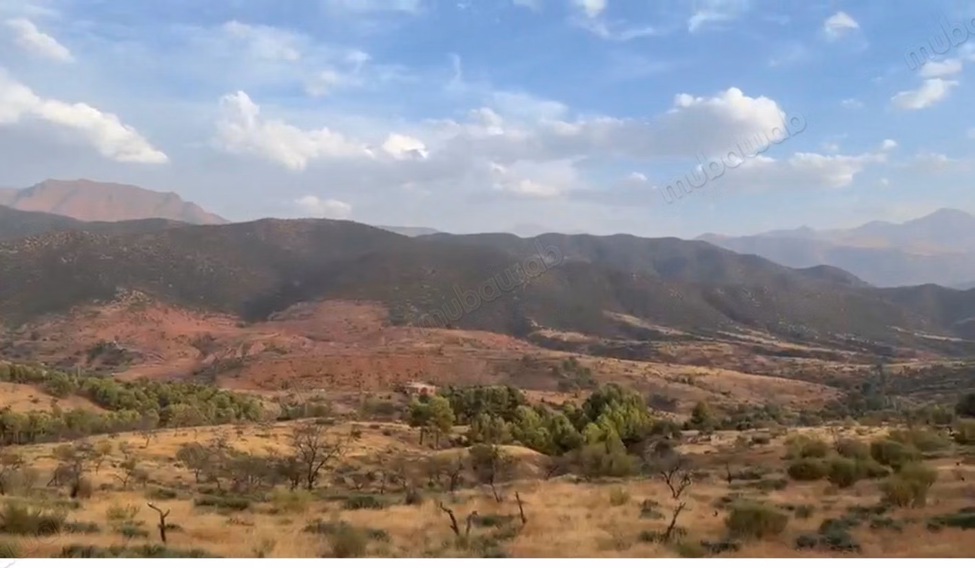 En venta – 6,62 ha titulados en Tnine Ourika, frente a la villa E – vista panorámica del Atlas y el valle – potencial turístico