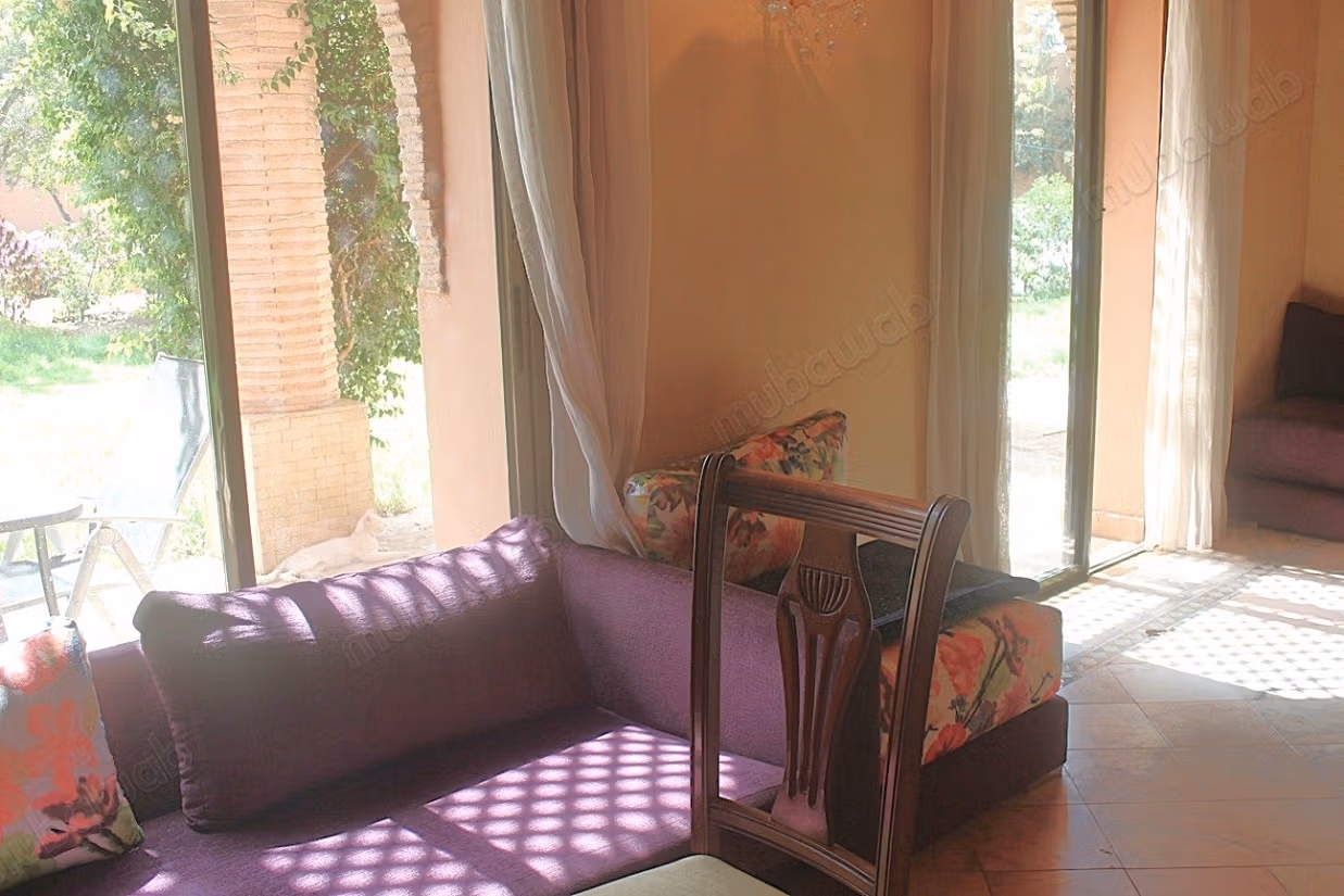 Grand appartement en rdjardin a la Palmeraie