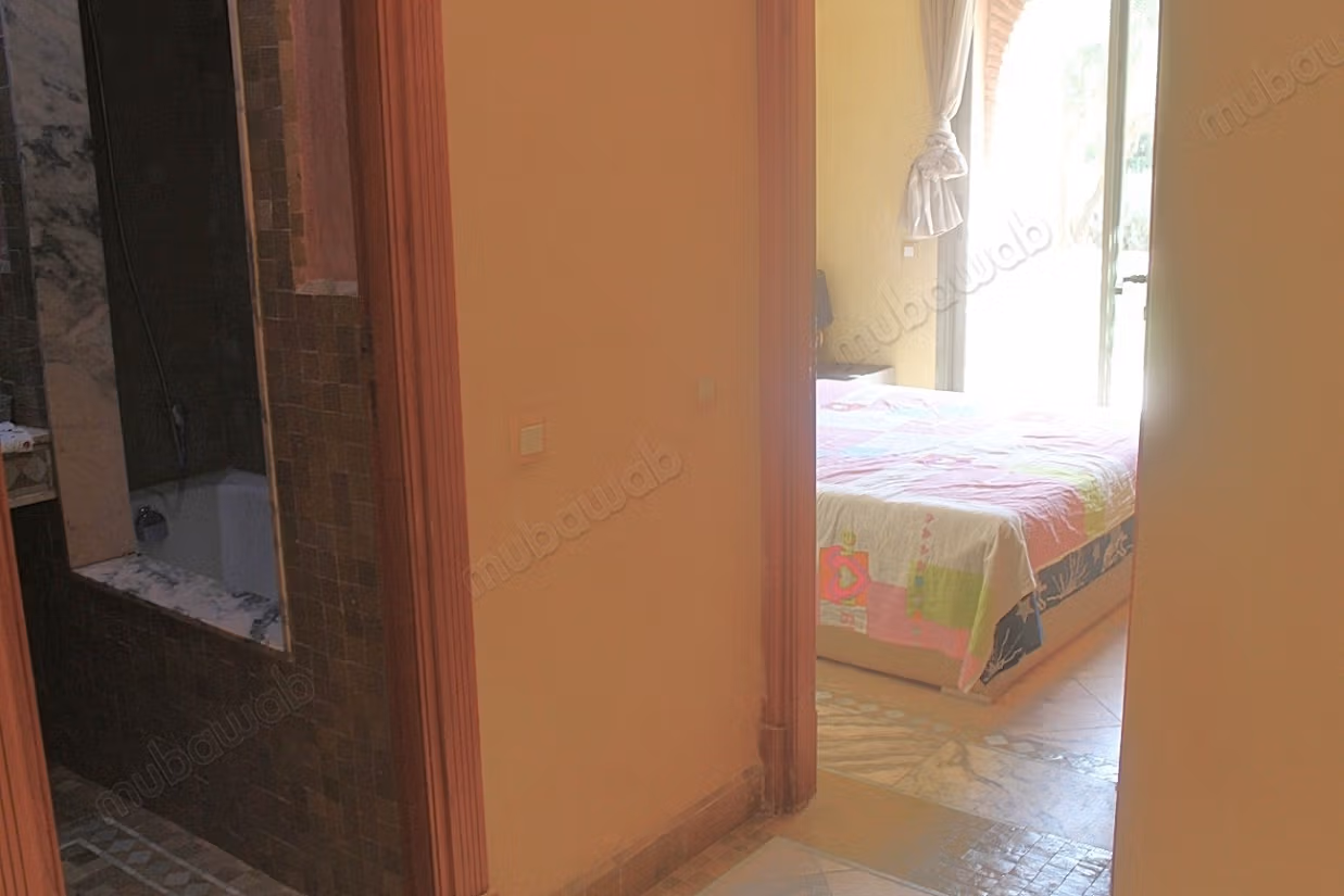 Grand appartement en rdjardin a la Palmeraie