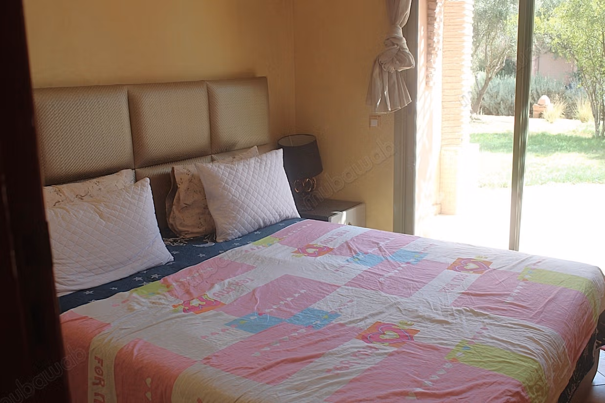 Grand appartement en rdjardin a la Palmeraie