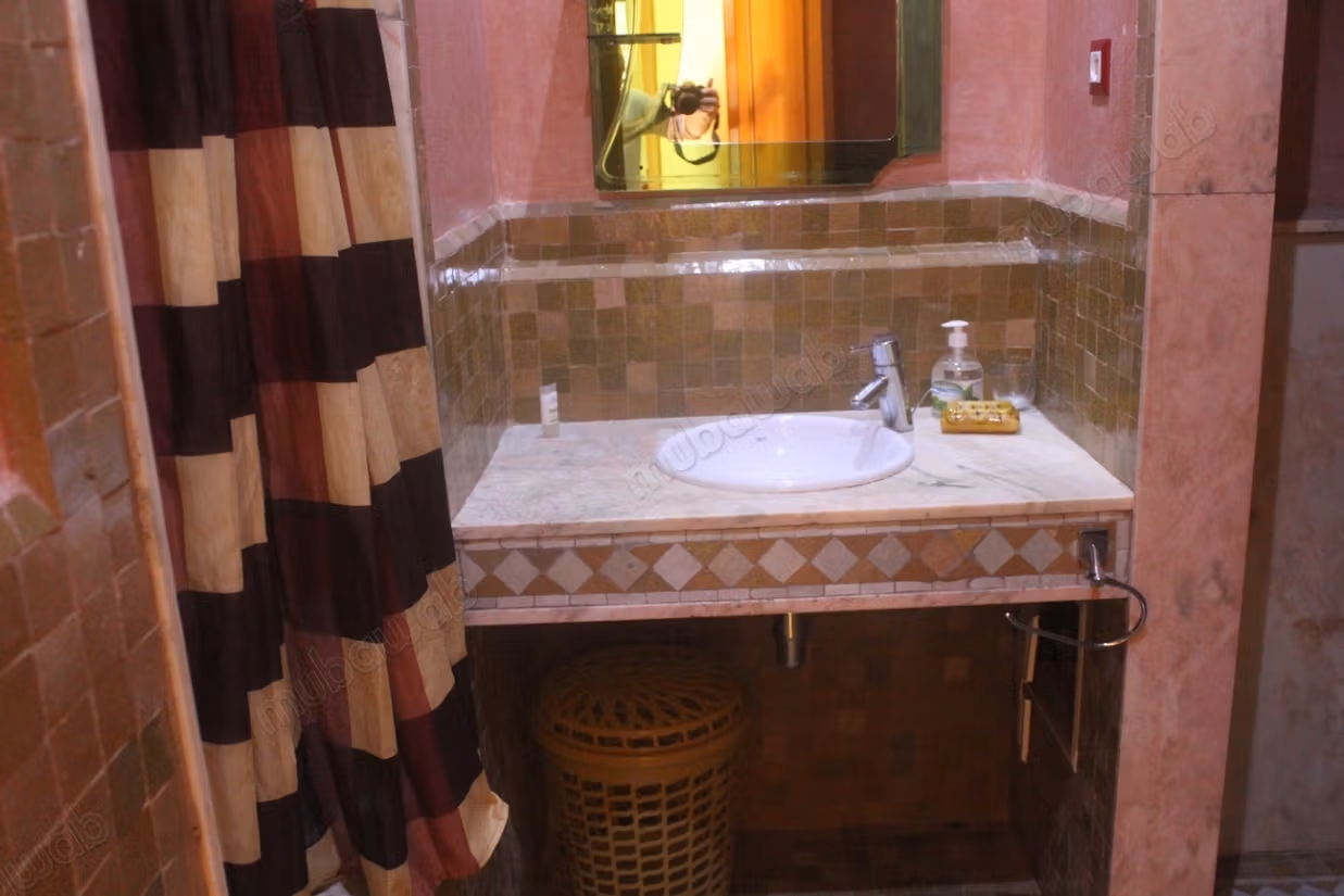 Grand appartement en rdjardin a la Palmeraie