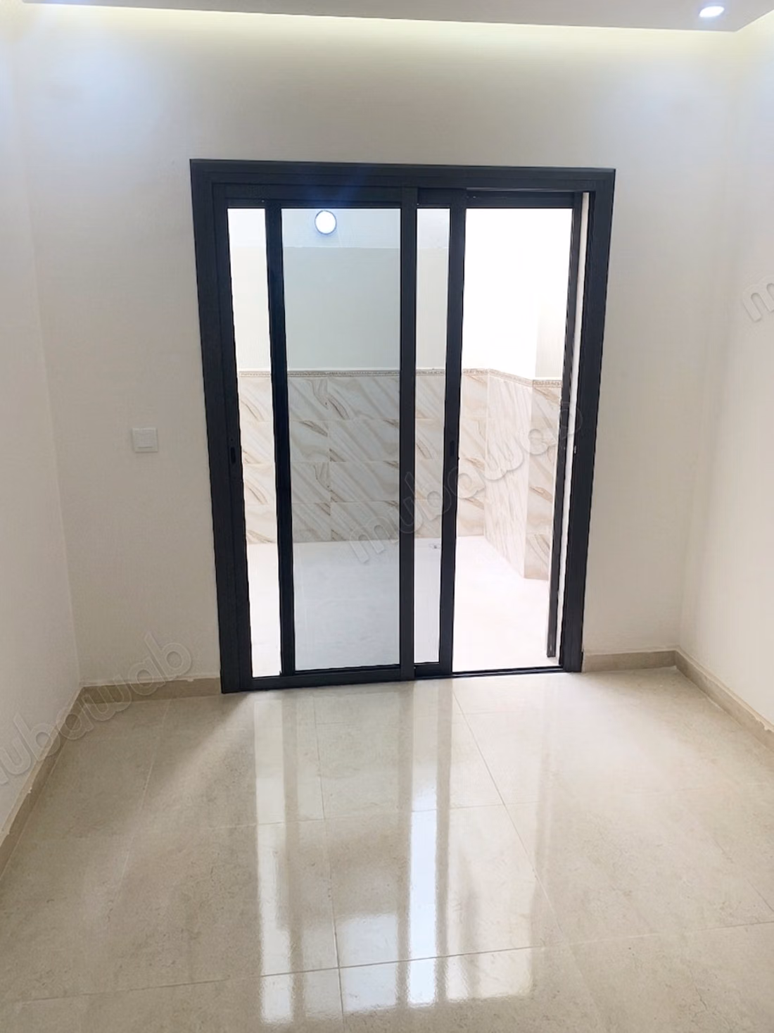 Appartement neuf avec jardin et cour privative