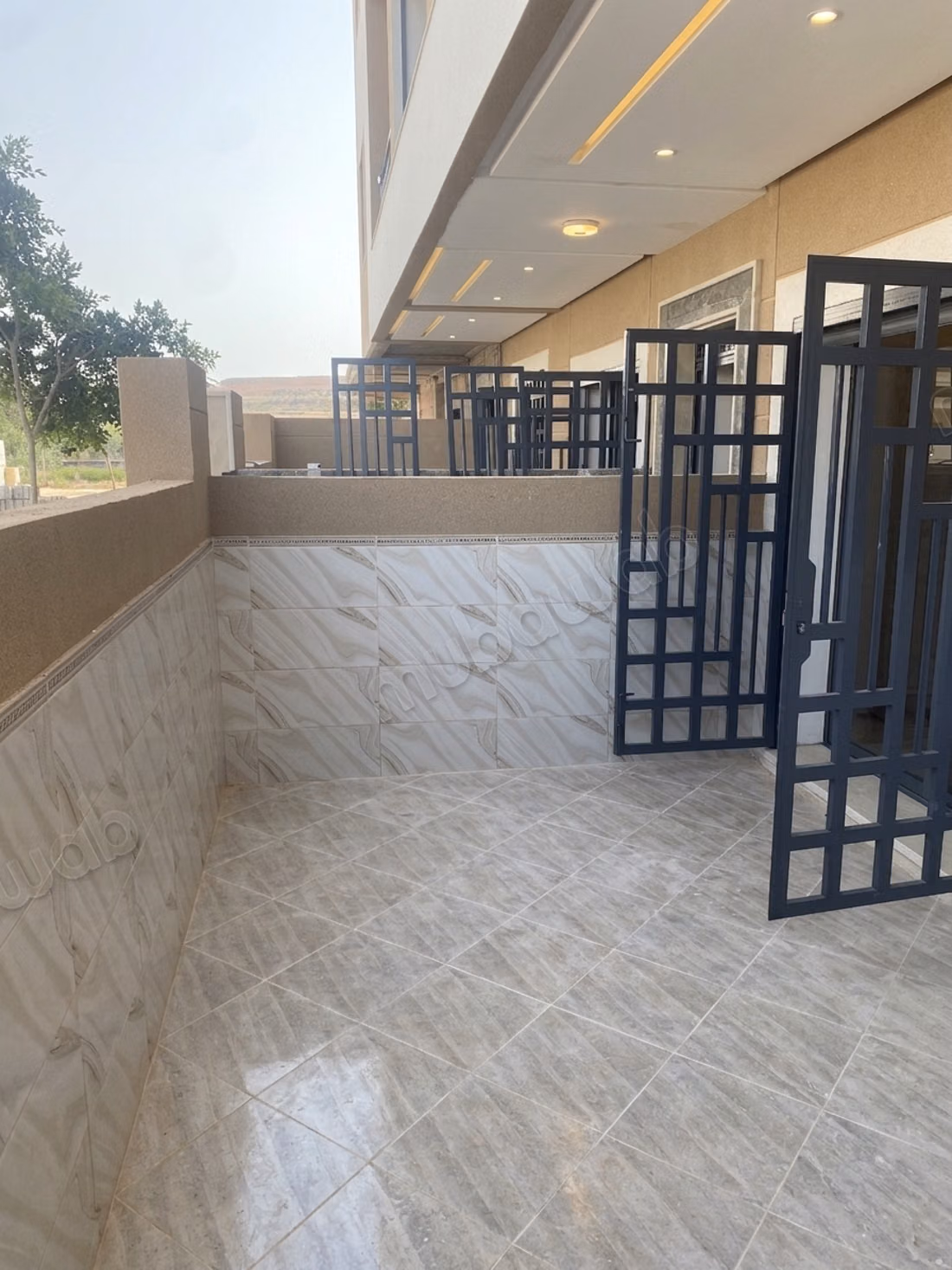 Appartement neuf avec jardin et cour privative