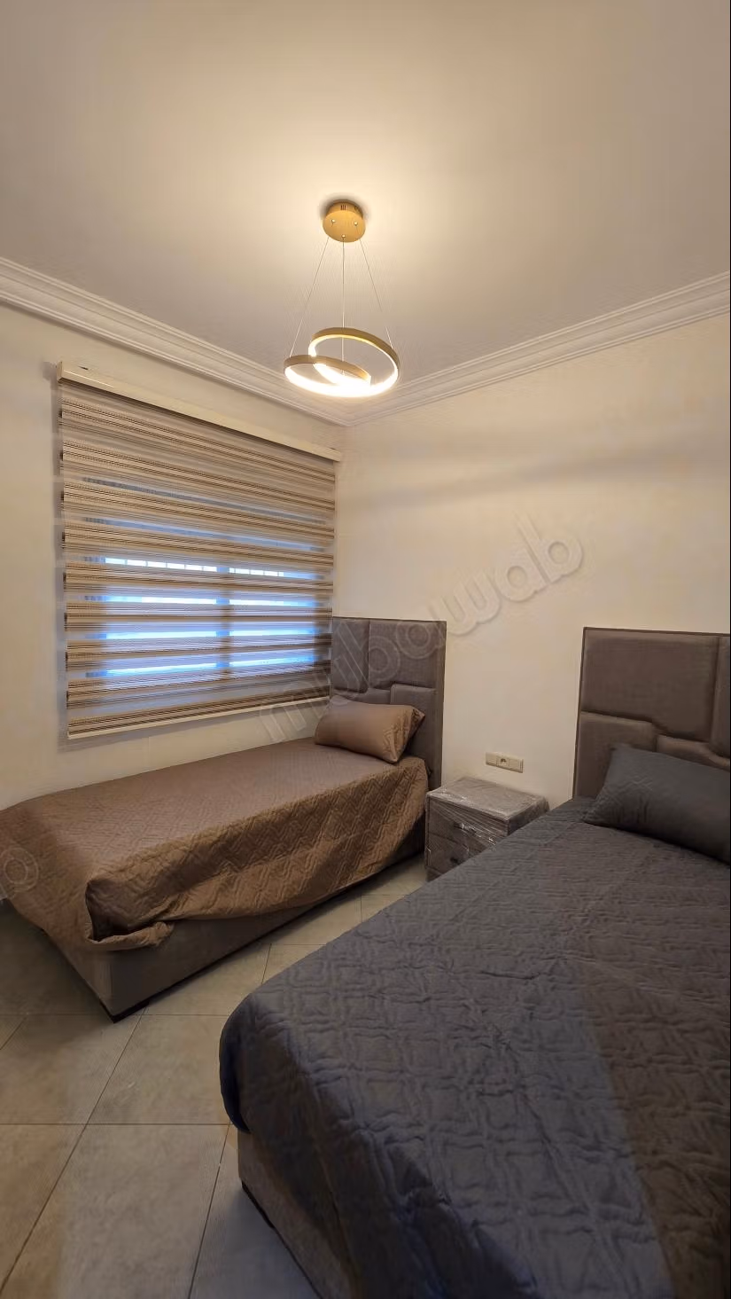 Bel appartement à louer à Martil. 2 chambres confortables. Environnement calme avec vue sur la montagne, fenêtre à double vitrage