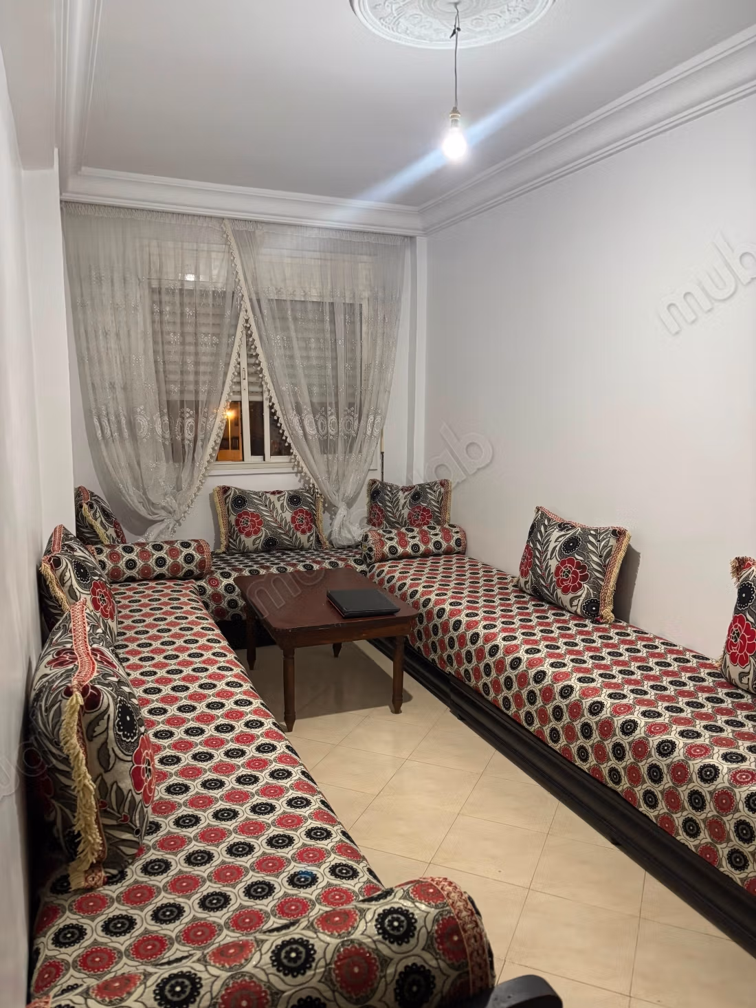 Appartement à vendre à Al Azhar. Superficie 67 m². Salon traditionnel marocain, résidence sécurisée