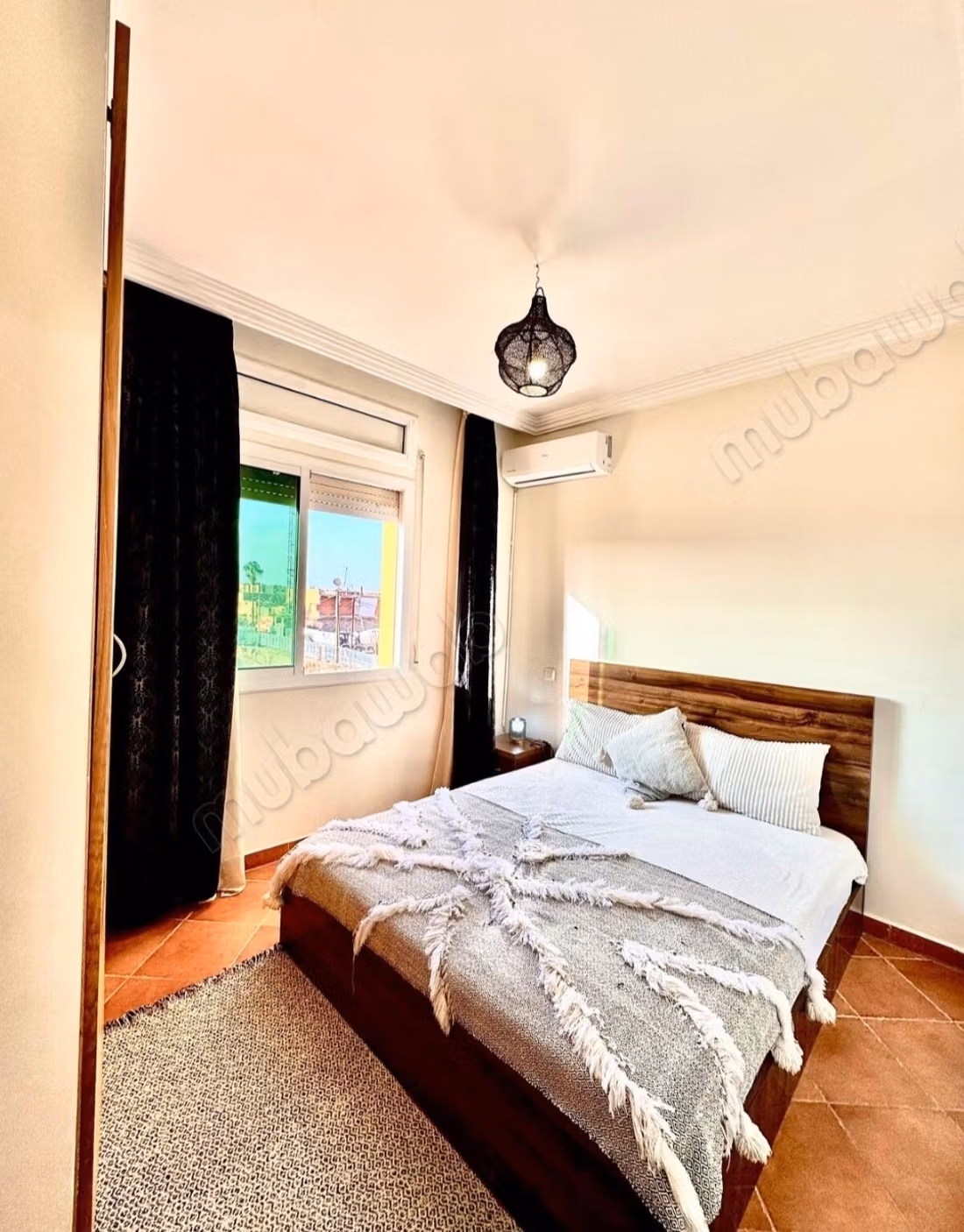 Location d'un appartement à Guéliz. 2 chambres agréables. Parking et jardin