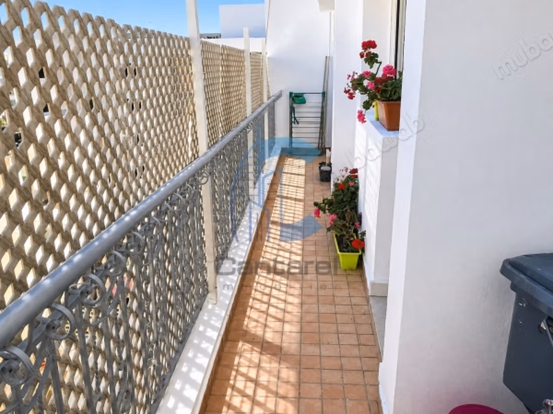 Furnished apartment overlooking – top floor – mine
