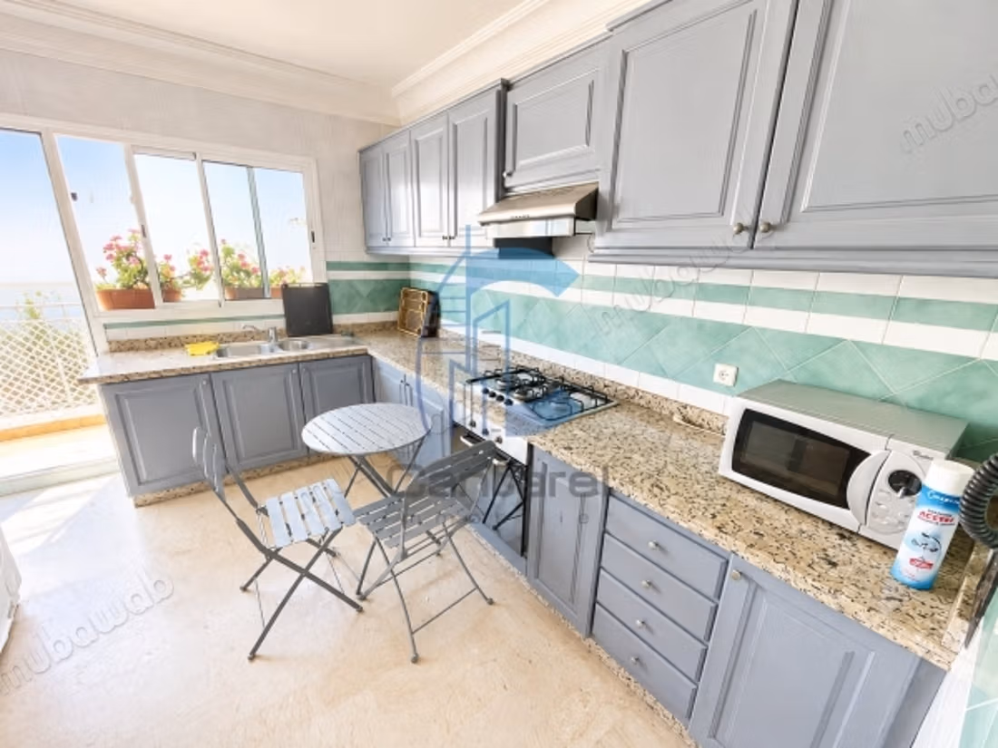 Furnished apartment overlooking – top floor – mine