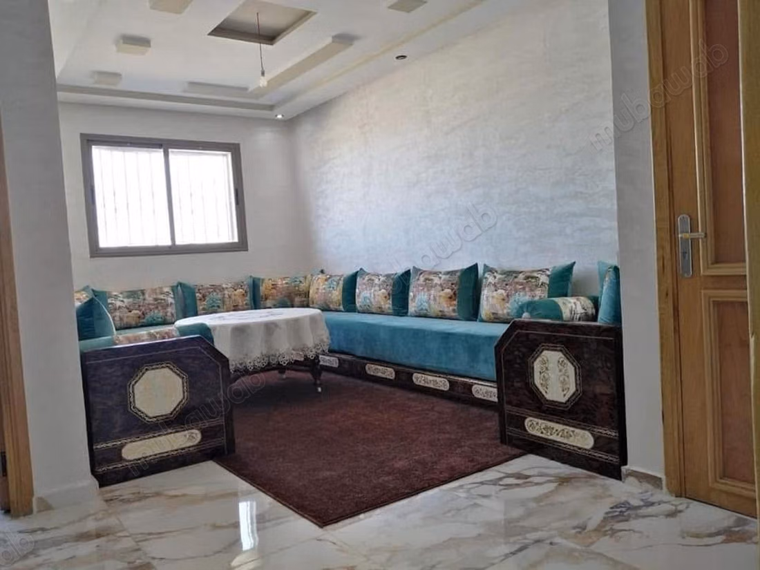 Appartement Dahomey City strand en gezellige Marjane