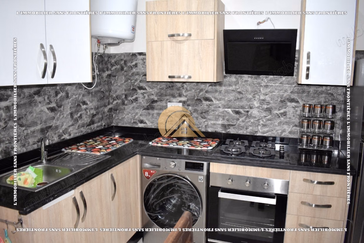 Appartement de 85 m² à louer à Targa – 2 chambres, double salon, terrasse, piscine et jardin collectif