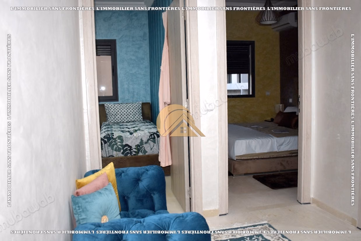 Appartement de 85 m² à louer à Targa – 2 chambres, double salon, terrasse, piscine et jardin collectif