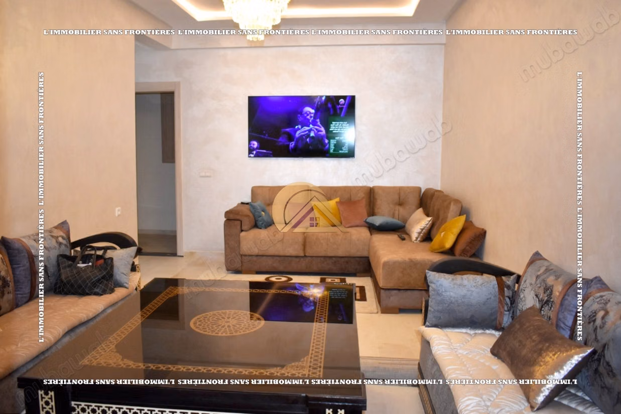 Appartement de 85 m² à louer à Targa – 2 chambres, double salon, terrasse, piscine et jardin collectif