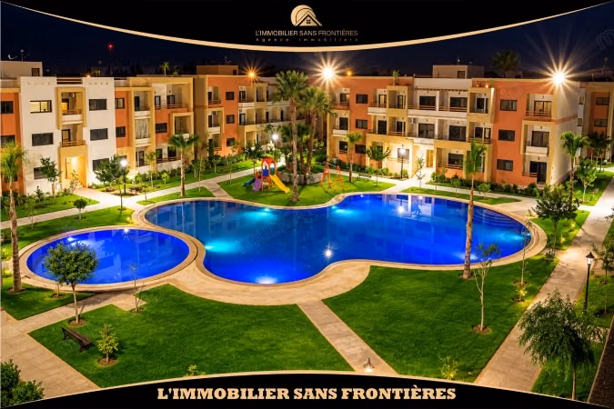 Appartement de 85 m² à louer à Targa – 2 chambres, double salon, terrasse, piscine et jardin collectif