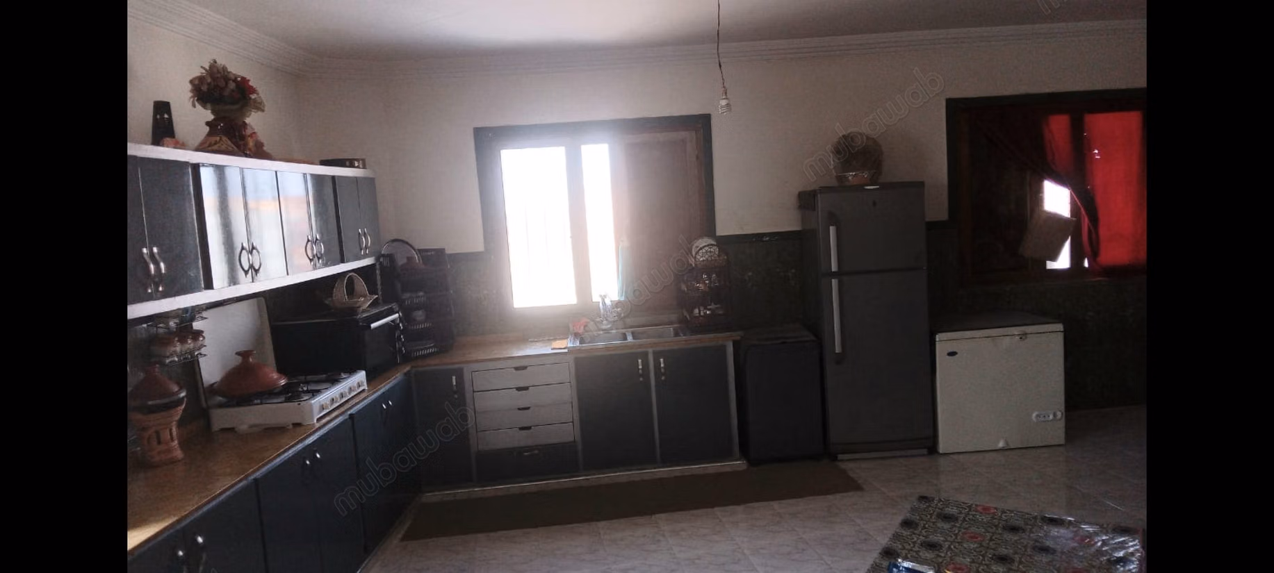 Immeuble à vendre avec des appartements et magasin