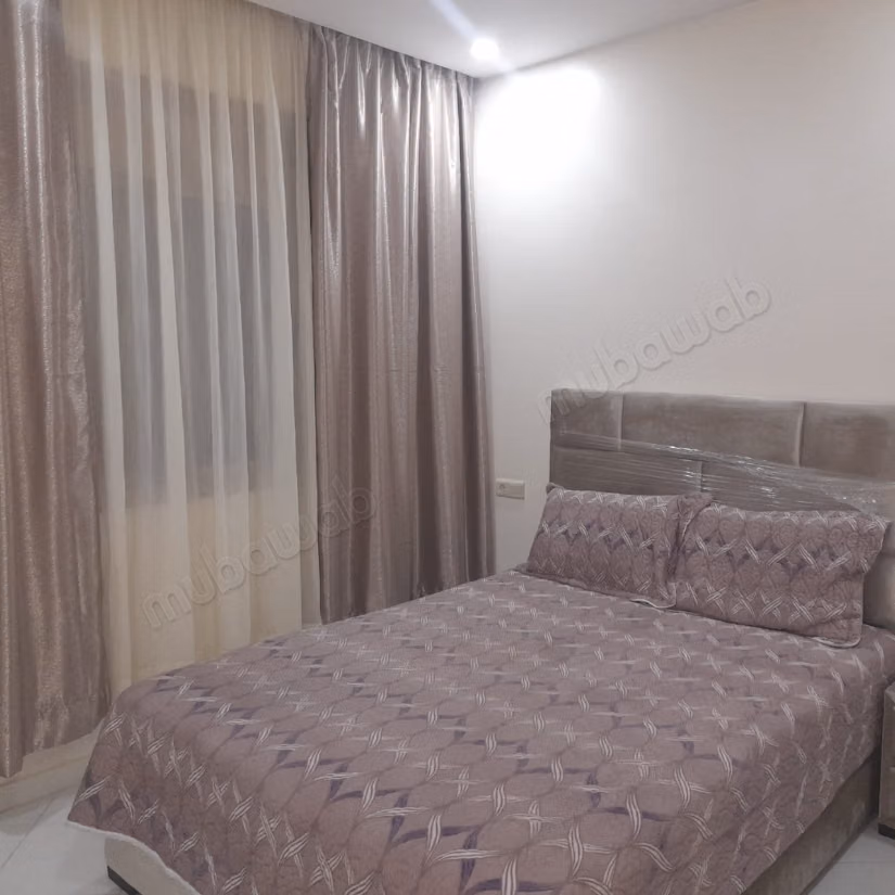 Vakantieappartement te huur in Hay Al Wafaa. 2 mooie slaapkamers. Typische Marokkaanse woonkamer, beveiligde residentie