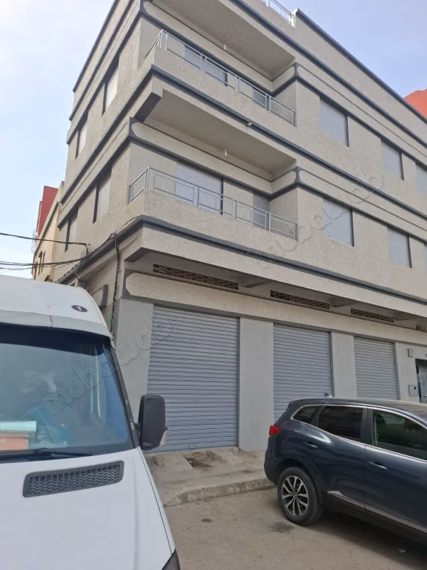 Commercial house with 2 apartments.  6 parking spaces