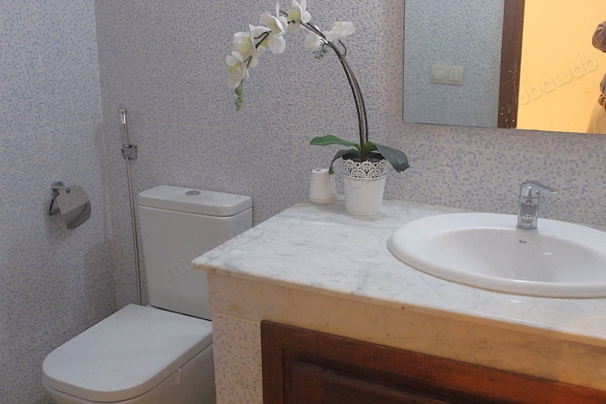 Grand appartement de 3 chambres en rdc