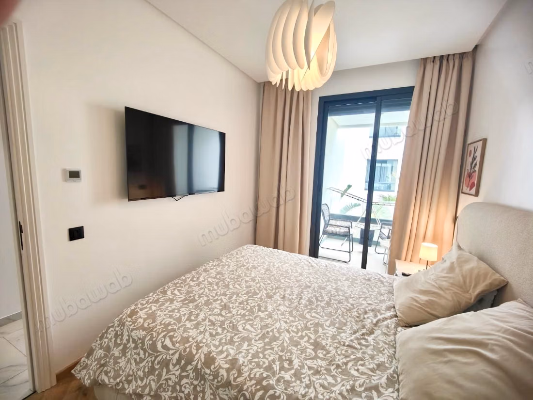 En Vente Meublé: Magnifique Appartement 3 chambres dans une résidence fermé avec piscine salle de sport et espaces verts au Cœur du Quartier Domaine D’Anfa à Casablanca — 6