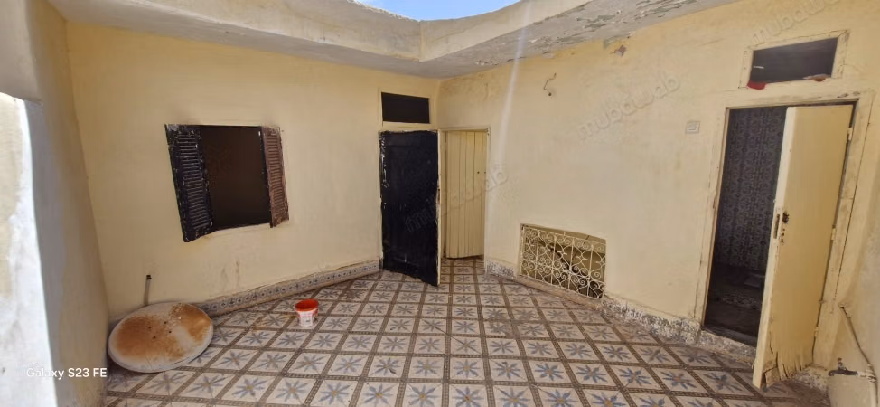 Maison de 60 m² avec Magasin Attenant